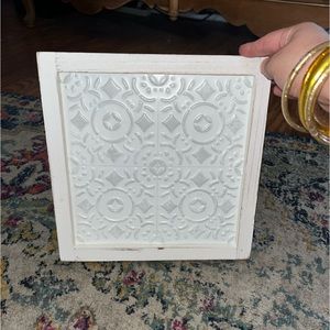 White “tin roof” piece